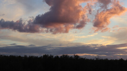 Breathtaking Sunset Over Desert Mountains with Silhouetted Road and Golden Hour Sky