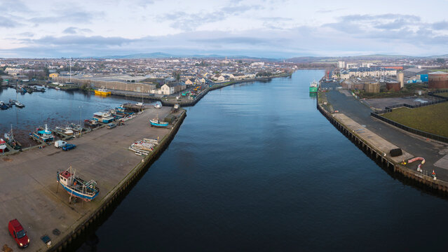Drone panorama of Arklow Harbour showing River Avoca, working quays and coastal town in co. Wicklow, Ireland.