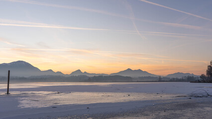 Sunset on Lake Hopfen in Bavaria Germany in Winter 2025 - Great Orange and Blue - Beautiful Alps...