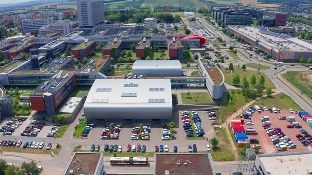 Down drone shot of sport hall of brno university in city center