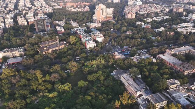 Drone footage over Okhla Mandi railway station captures the organized chaos of one of Delhi&rsquo;s largest markets, with endless stalls, moving traffic, and urban life framed by green surroundings.
