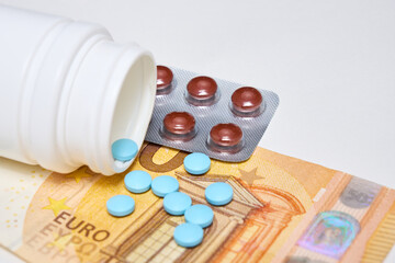 pills with a tube on money