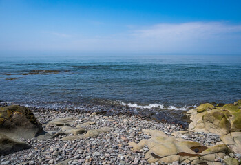 Rocky rugged coast of the Bay of Fundy at the Black Rock Lighthouse on the western side of Nova Scotis Canada