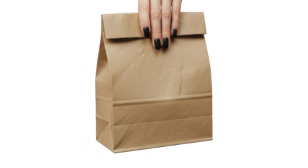 Woman hand holding blank brown paper bag takeaway food packaging isolated on transparent background