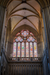 Stained glass window of the south transept seen from inside Notre-Dame Cathedral of Bayeux