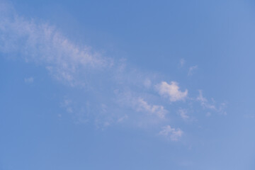 Beautiful soft cirrus clouds across a bright azure sky
