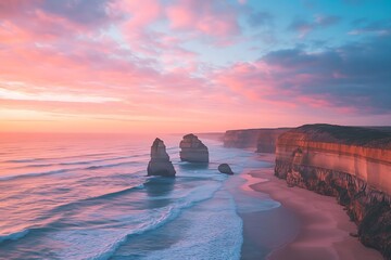 Serene sunset paints the Twelve Apostles in breathtaking pink and purple hues, a tranquil coastal masterpiece under a soft sky.