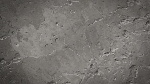 Gray lunar surface with craters