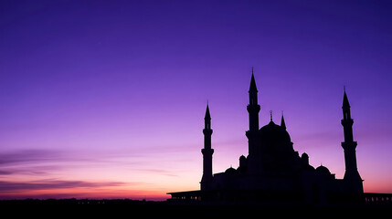 Mosque silhouette against a vibrant purple twilight sky