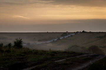 Salisbury plain at sunset, Image shows the empty fields across the plain during golden hour of sunset