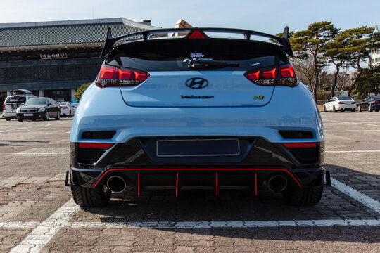 February 26, 2021, Seoul, South Korea - The rear view of a light blue Hyundai Veloster N DCT performance car parked in a lot at the Seoul Arts Center.