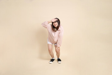 20s Asian woman in pink UV jacket