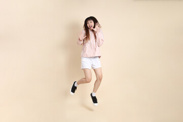 20s Asian woman in pink UV jacket