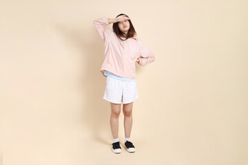 20s Asian woman in pink UV jacket