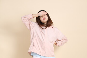 20s Asian woman in pink UV jacket