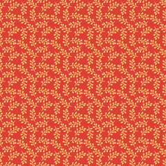 Seamless floral branch pattern with golden leaves on a red background. Warm and festive botanical design ideal for autumn branding, textiles, and seasonal decor.