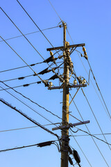 High voltage post, High voltage tower, show with high voltage construction and power lines.