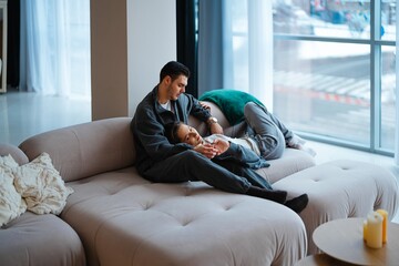 Cozy family moment on a stylish sofa in a modern living room