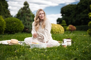 Enjoying a serene picnic on a sunny day in a lush green park