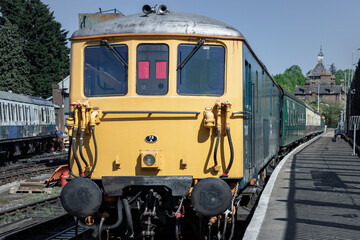 View of A train engine or Locomotive and railway coaches in the Tunbridge Wells railway station and ready to leave. use it as your Wallpaper, Poster and Copy space, Selective focus.