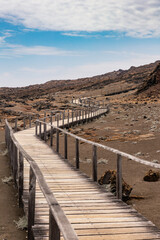 Wooden steps and boardwalks on the beautiful hike to the top of Bartolome Island in the Galapagos 