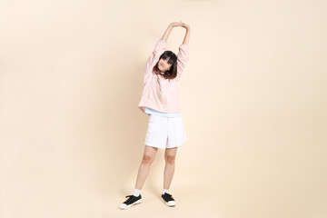 20s Asian woman in pink UV jacket