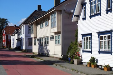 Stavanger city, Norway. Local residential street with typical Nordic wooden houses.
