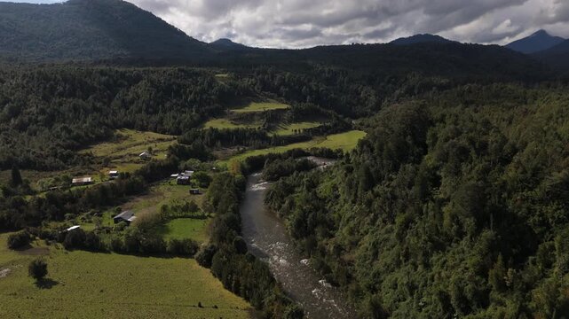 Epic Aerial View of Valley River and Mountain Landscape