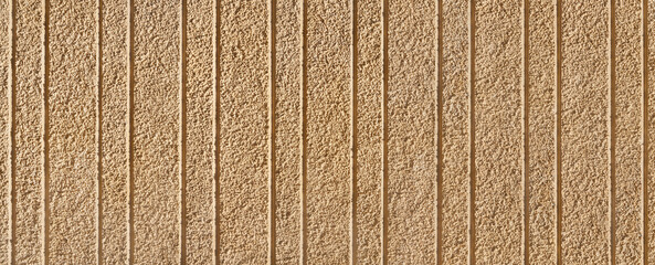 Rough roughcast wall, close-up.