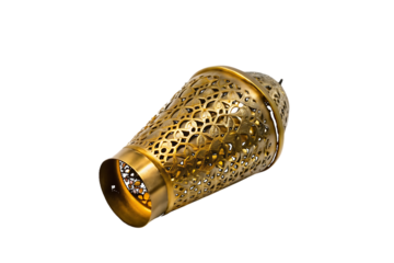 Gold thimble with intricate floral patterns on white isolated on a transparent background