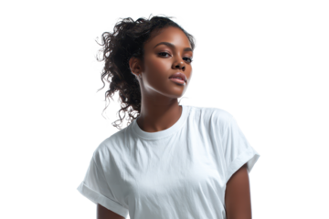 Young woman poses with confidence in a simple white t-shirt against a light background during a studio session