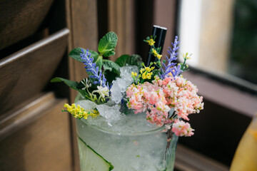 A drink with a flower on top of it