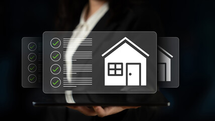 A business professional showcases a digital home listing on a tablet, illustrating the intersection of technology and real estate in modern property management. Gantry