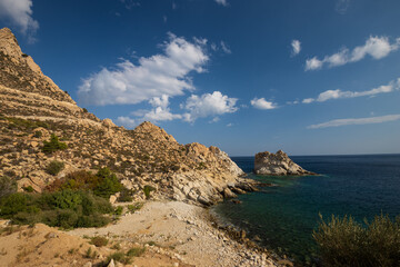 Rocky cliffs at Kalou beach, Ikaria, North Aegean Islands, Greece
