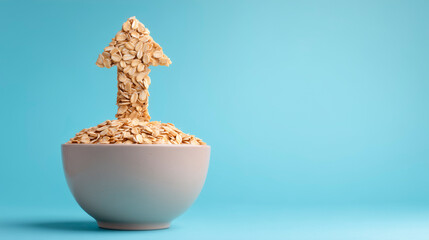 Bowl of oat flakes or granola for breakfast in the shape of an arrow pointing upwards, concept of personal growth and success through nutrition