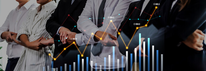 A modern office scene depicting business professionals collaborating with financial data visualizations, showcasing teamwork, analytics, and strategic insights. Scalp