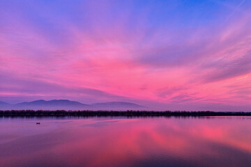 Sunrise Reflections on Calm Lake. Kerkini, Northern Greece