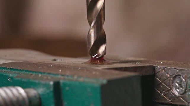 Industrial Metal Drilling in Slow Motion - Close Up