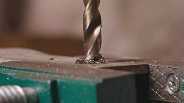 Industrial Metal Drilling in Slow Motion - Close Up