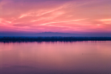 Sunrise Reflections on Calm Lake. Kerkini, Northern Greece