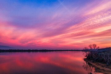 Sunrise Reflections on Calm Lake. Kerkini, Northern Greece