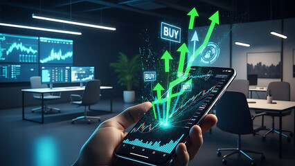 Fototapeta premium A person holding a smartphone with a stock market graph and buy signals in a modern office