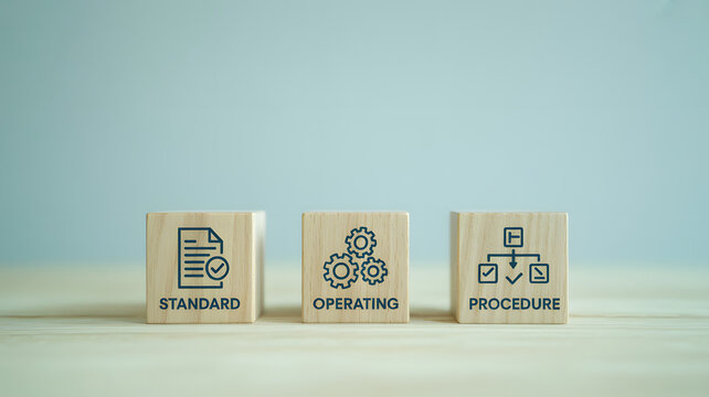 SOP Standard Operating Procedure Concept Visualized on Wooden Blocks for Business System Standardization.png