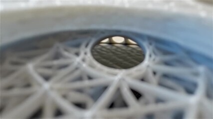 3d printing circular hole lattice structure intricate design modern technology craftsmanship plastic material close up showcasing detailed geometric
