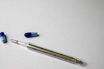 Thermometer With Medicine Capsules