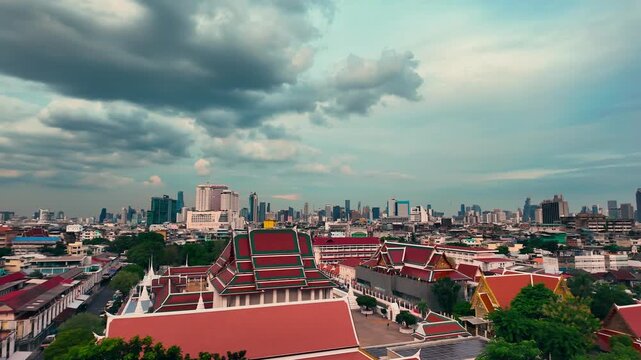 Panorama of Bangkok skyline from Wat Saket temple rooftop, Cityscape view with Thai temple roofs and urban horizon 4k