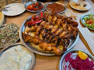 Turkish-style grilled chicken, cooked chicken wings. Ramadan meals.