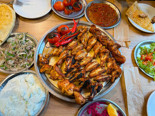 Turkish-style grilled chicken, cooked chicken wings. Ramadan meals.