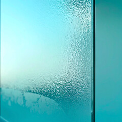 Angled View of Textured Teal Metallic Panel with Reflective Surface