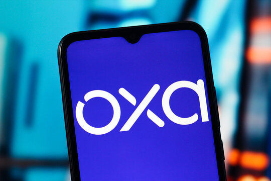 In this photo illustration, the Oxa Autonomy logo is seen displayed on a smartphone screen.